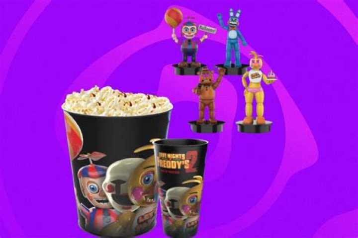Are there special ‘FNAF’ popcorn buckets and themed cups in theaters?