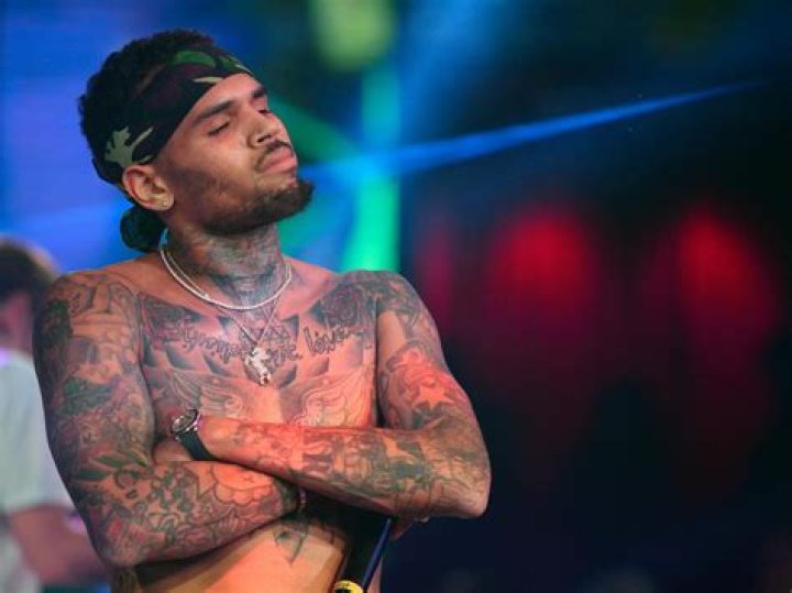 Chris Brown Is Under Fire: A 24-Year-Old Woman Reportedly Claims He Raped Her A Few Days Ago In His Paris Hotel Room