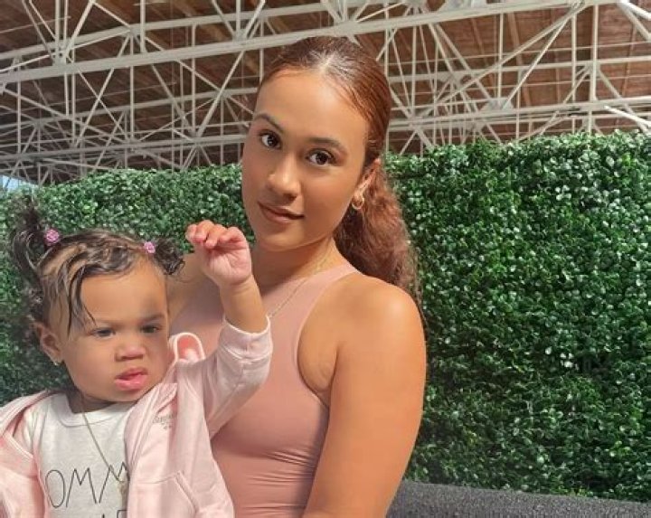 Chris Brown’s Baby Mama, Ammika Harris, Shows Off Her Stunning Post-Baby Figure In Pink/Angel Bodysuit And Bashes Those Asking To See Her Son, Aeko’s Photo