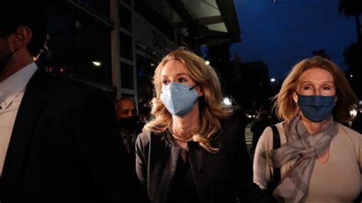 Who is Elizabeth Holmes and what was Theranos?