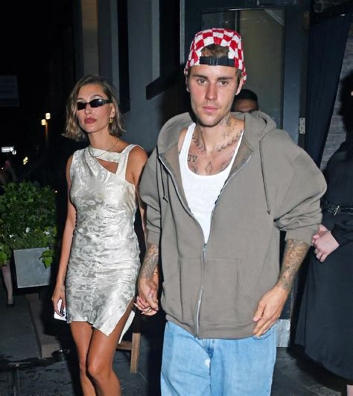 Hailey Bieber Flaunts Her Figure In Plunging Mini Dress As She Rings In The New Year With Justin Bieber
