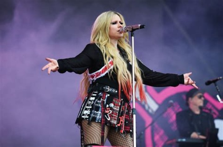 How many husbands has Avril Lavigne had?