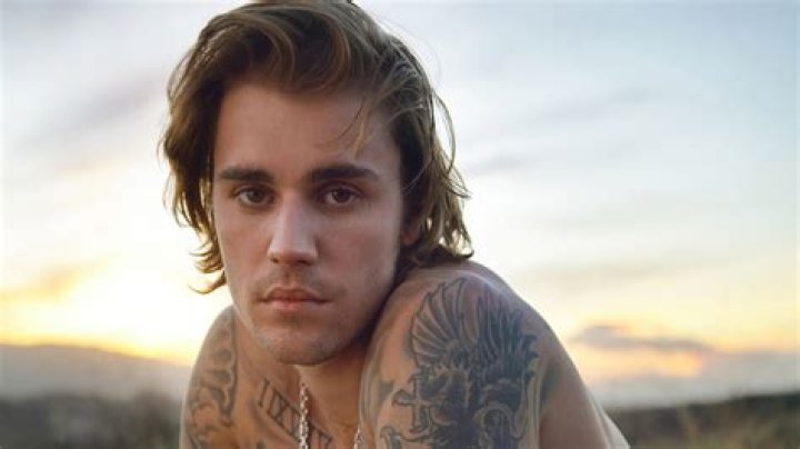 Justin Bieber Is Shirtless And Tattooless In Anyone Video With Zoey Deutch