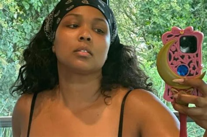 Lizzo Puts Her Beach Body On Full Display In New Swimsuit Photos