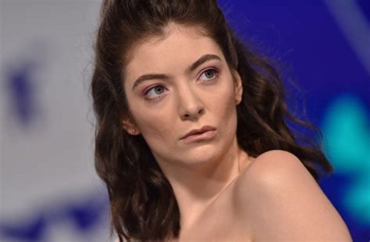 Lorde Shares Swimsuit Photo "Swimming"