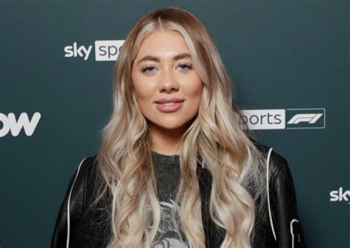 Paige Turley in Bathing Suit Top Says "Until Next Year IBZ" — Celebwell