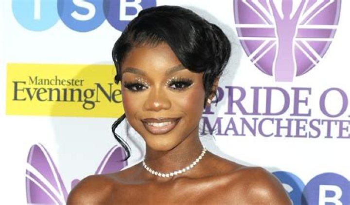 Tanya Manhenga in Bathing Suit Shares "Outfit Info" — Celebwell