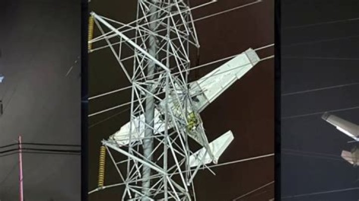 
Pilot on 911 Call from Dangling Plane that Crashed into Power Lines: ‘If We Get Some Wind … We’re Goners’ 