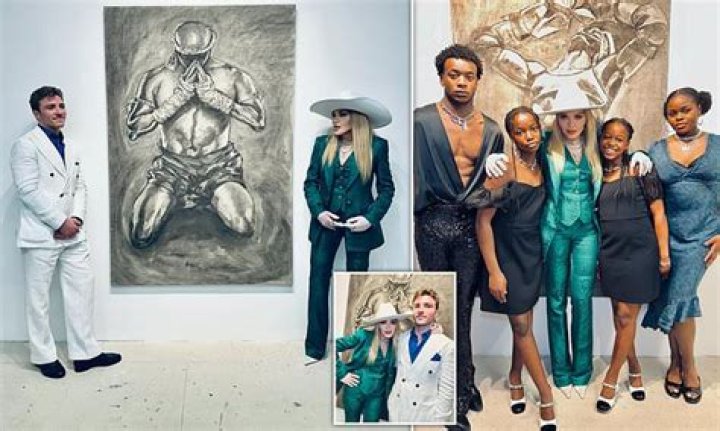 See Madonna and Guy Ritchie’s son posing with his sister at an exhibition of his paintings