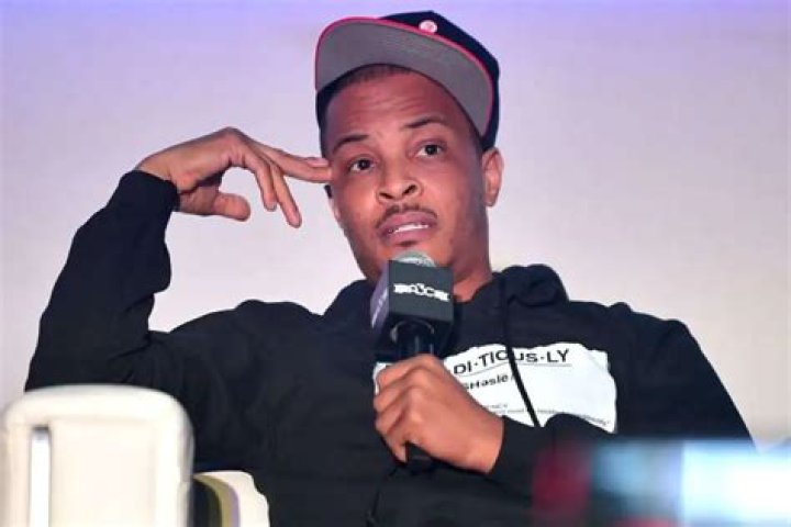 T.I. Reveals His Secret Family And Fans Co Grazy – Check Out This Mind-Blowing Family Portrait Featuring The Rapper