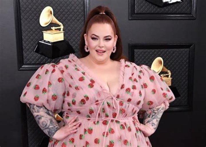 Tess Holliday Wears Lirika Matoshi Strawberry Midi Dress, Swarovski Crystals And Natalie Mills Jewelry On The Red Carpet
