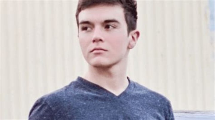 What are the charges against Austin Aldama, Monica Aldama’s son?