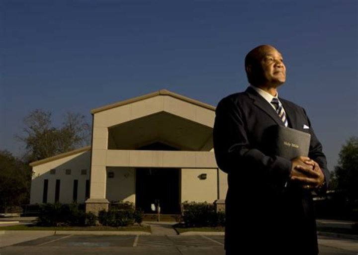 What is the name of George Foreman’s church and where is it located?