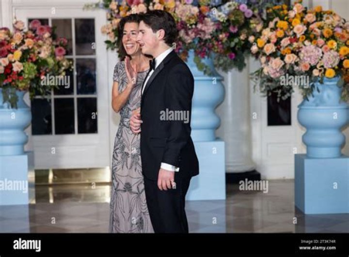 Who is Andrew Moffit, husband of Gina Raimondo?