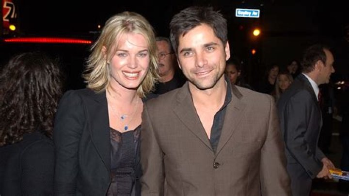 Why did John Stamos and Rebecca Romijn get a divorce?